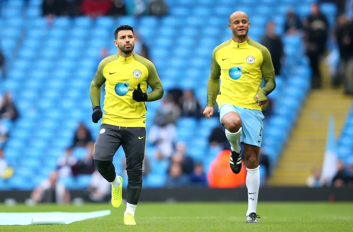 Sergio Aguero and Vincent Kompany of Manchester City warm up prior to the Premier League match between Manchester City and Swansea City.