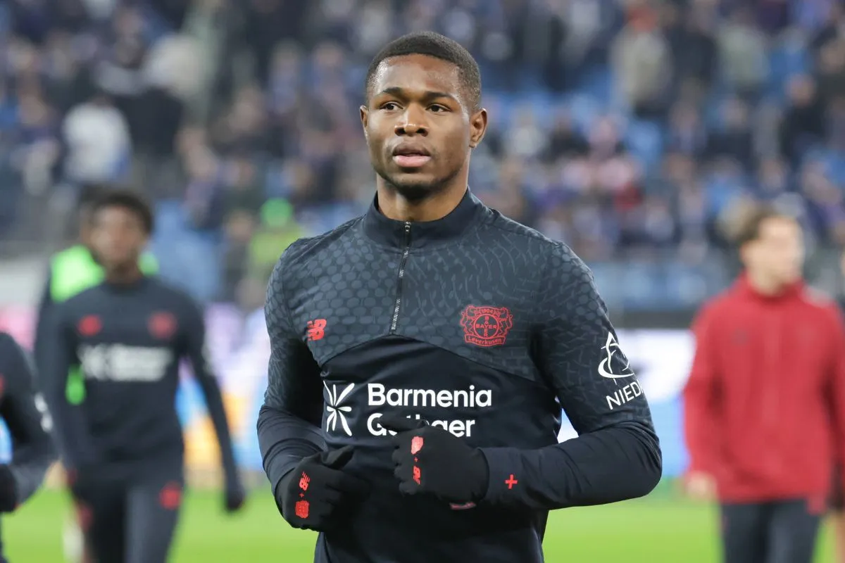 Christian Kofane pictured in action for Bayer Leverkusen.