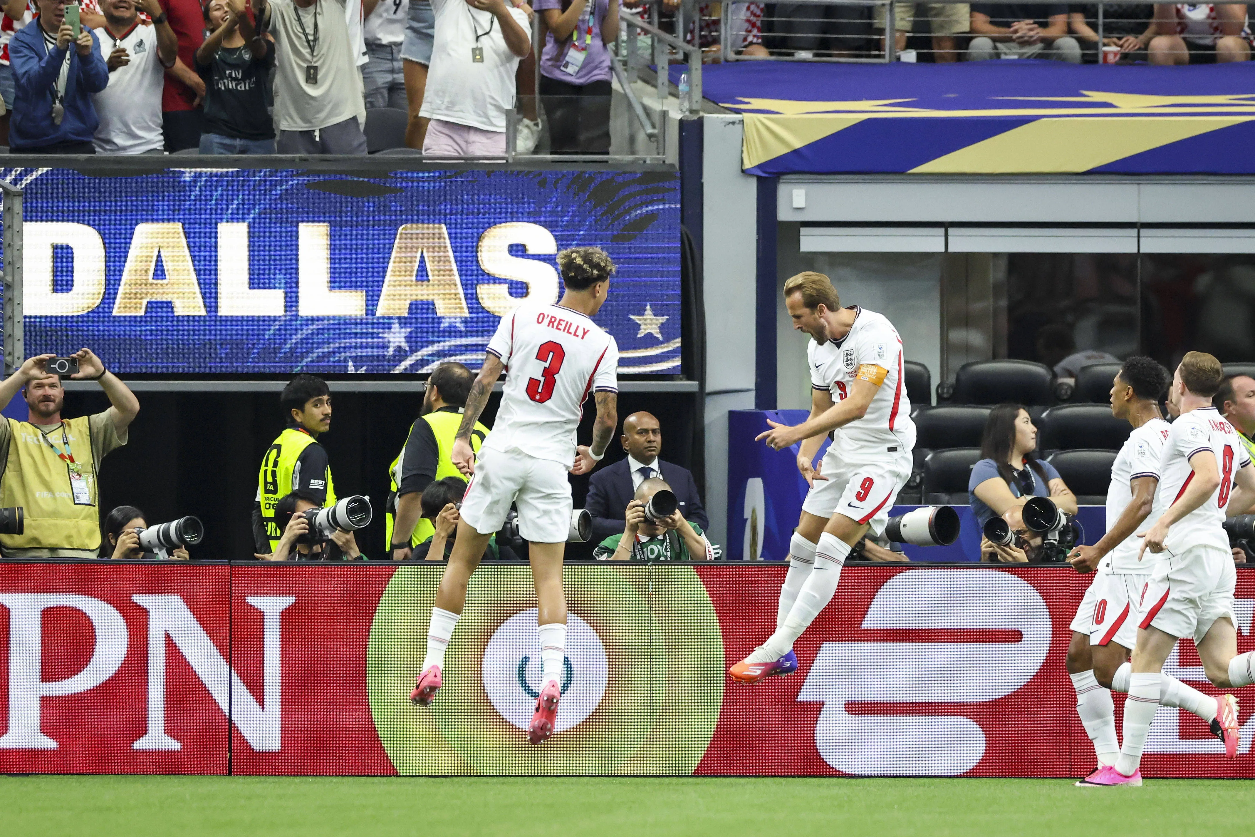 England duo Nico O'Reilly and Harry Kane celebrate goal vs Croatia at Dallas Stadium