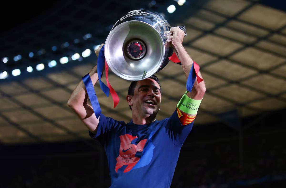 Barcelona midfielder Xavi lifts the Champions League after beating Juventus in the final