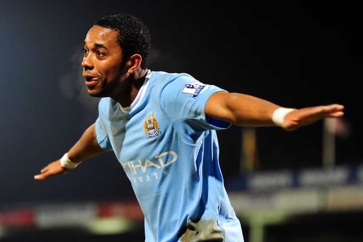 Manchester City's De Souza Robinho celebrates scoring his sides fourth goal of the game