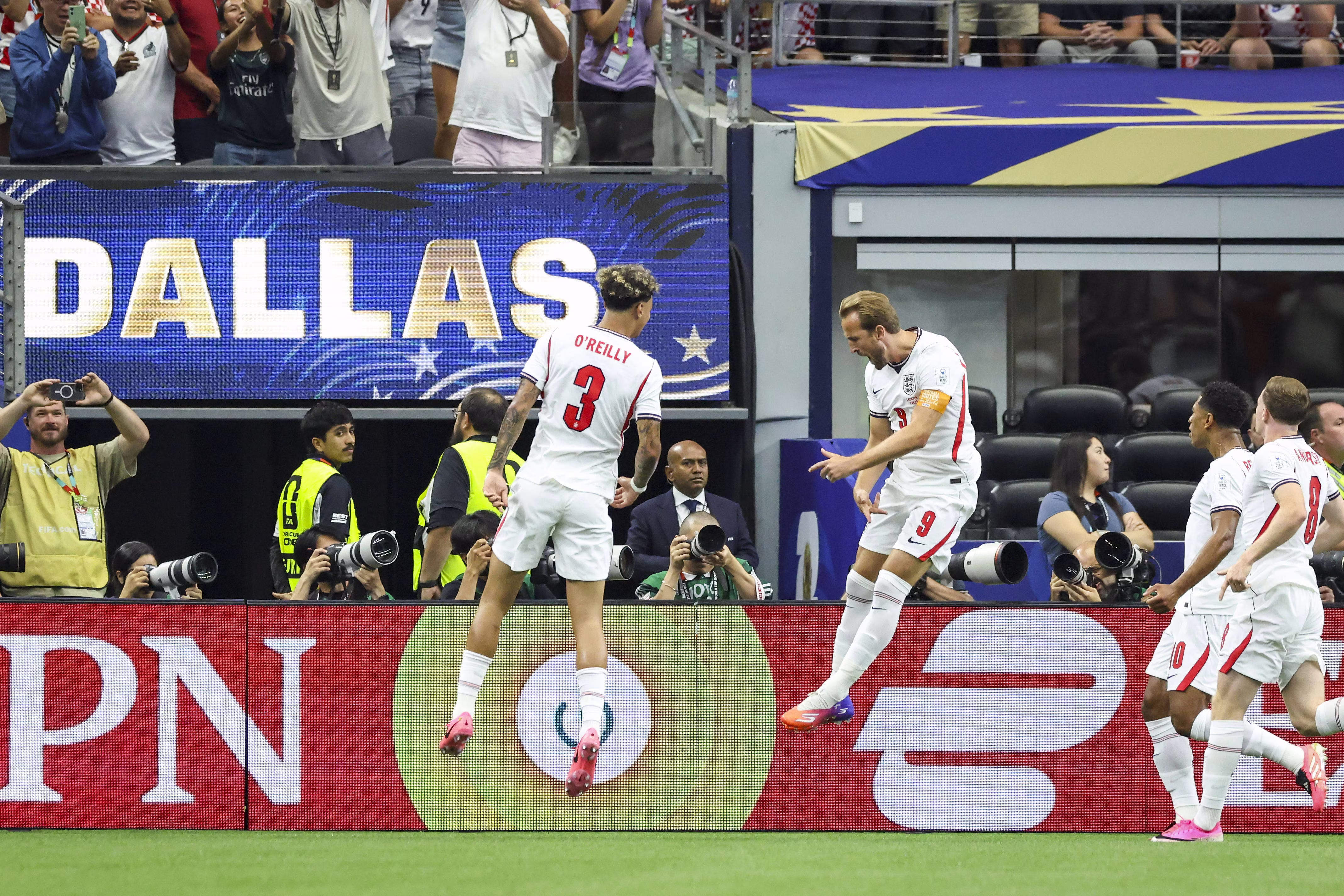 England duo Nico O'Reilly and Harry Kane celebrate goal vs Croatia at Dallas Stadium