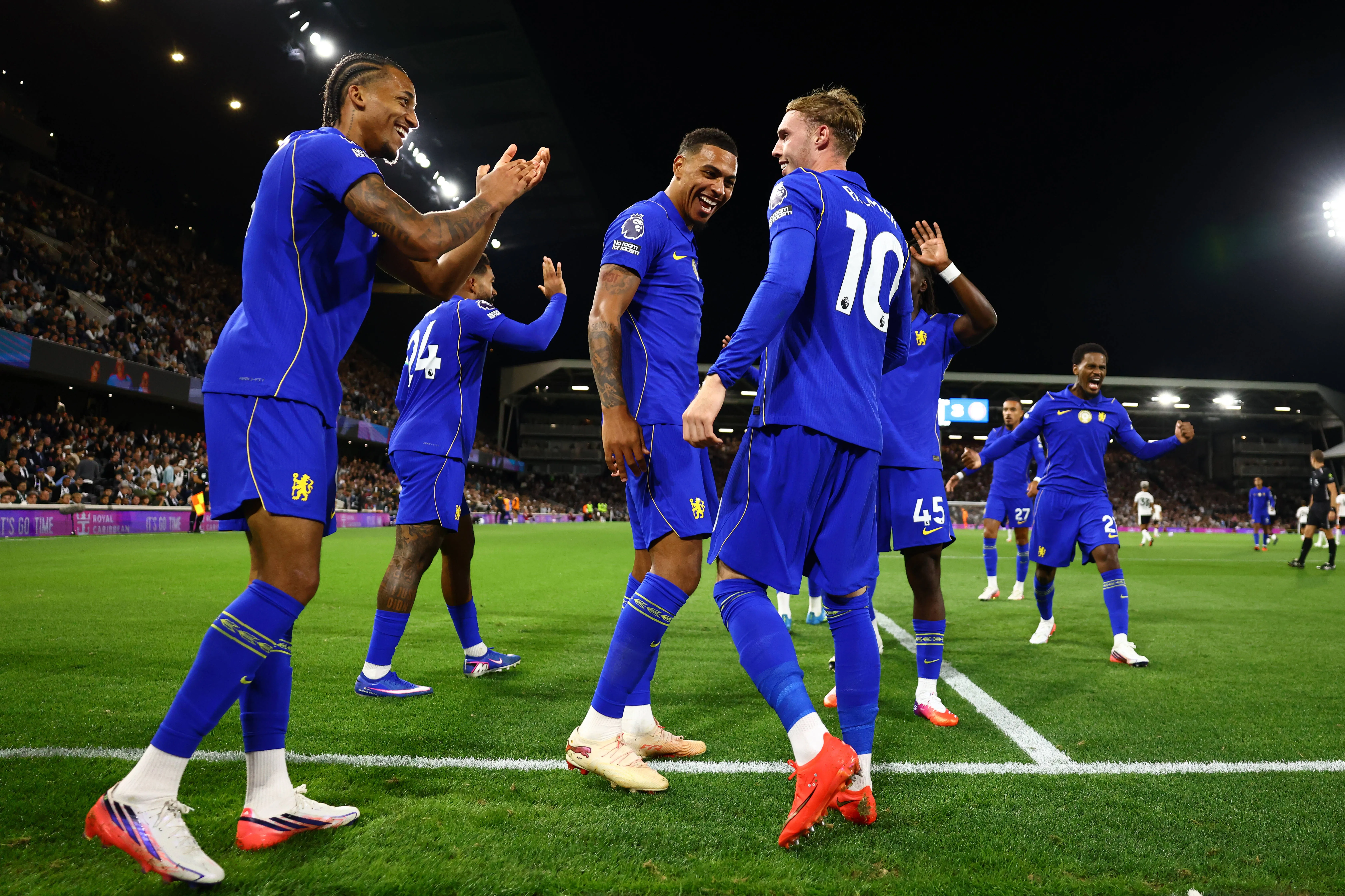 Chelsea's Cole Palmer celebrates with Joao Pedro and Morgan Rogers after scoring