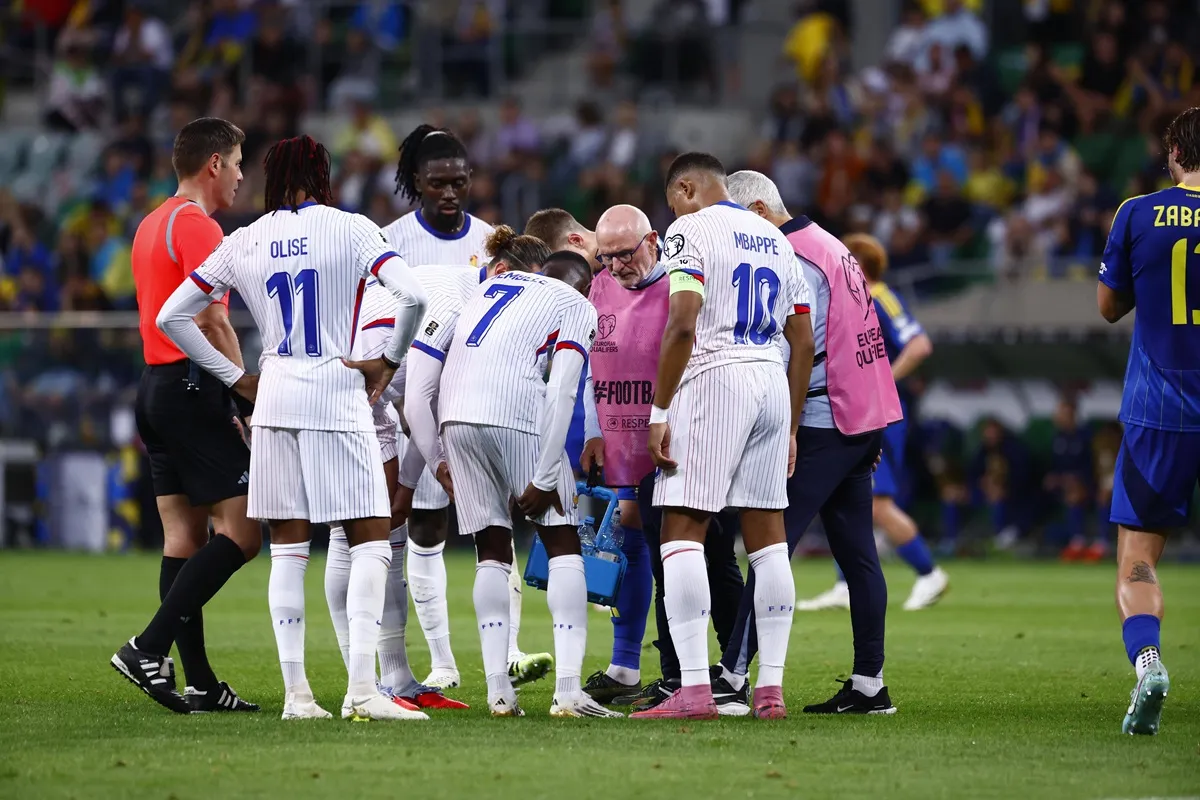 Kylian Mbappe, Ousmane Dembele and Michael Olise in action for France in September 2025